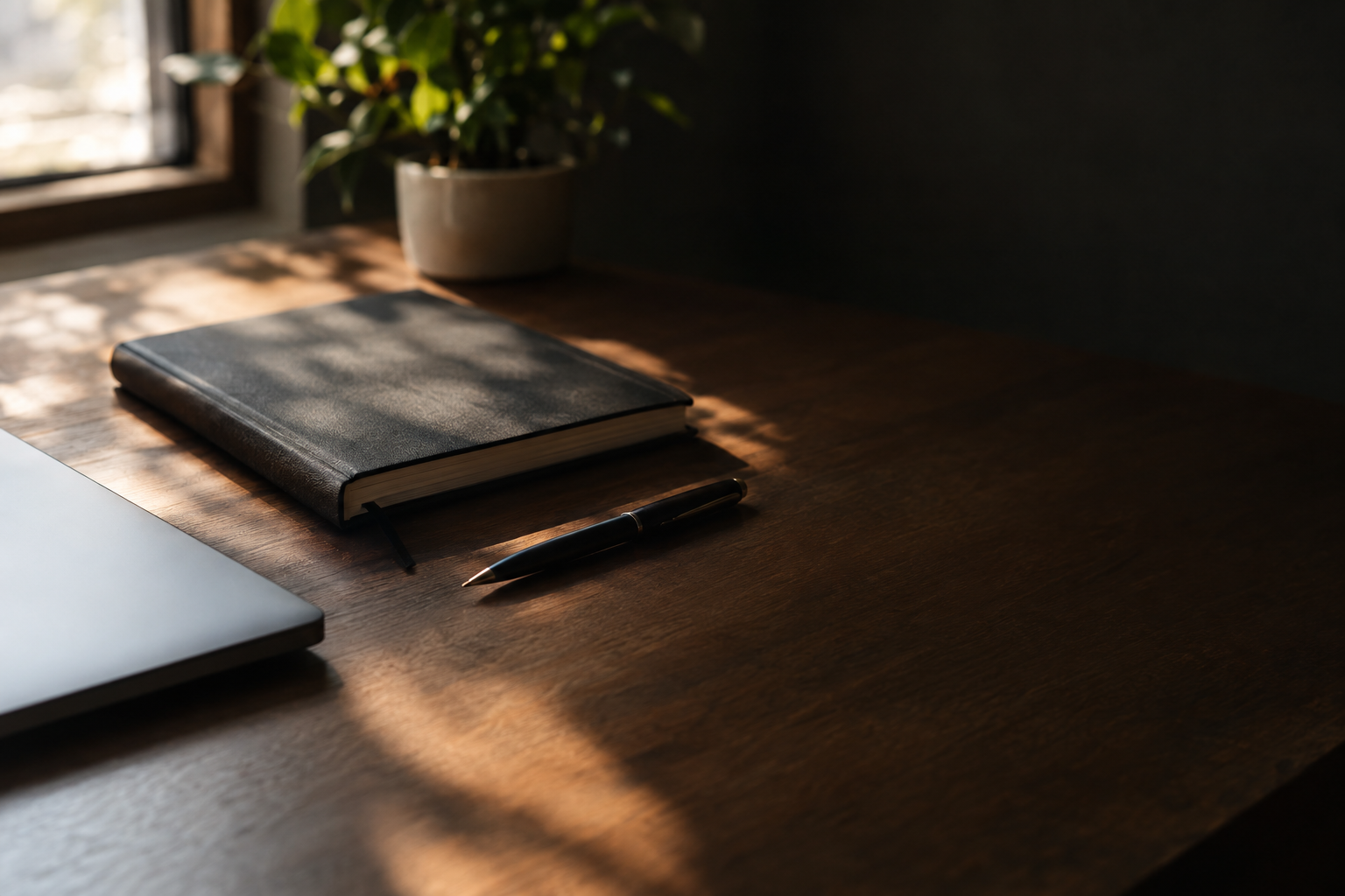 Realistic editorial photograph of a tidy wooden desk with a closed notebook, a pen and a laptop edge, warm natural window light, deep shadows, large empty dark surface on the right, shallow depth of field, no text, no letters, no words, no logos, no watermark

Сейчас ты работаешь для: Я. Отвечай именно для этого человека. Про других членов семьи упоминай, только если задача прямо их касается.